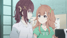 two anime girls are standing next to each other in front of a bulletin board that says ' menu ' on it