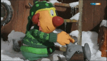 a cartoon character is standing in the snow and says hd on the bottom right