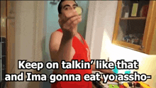 a man in a kitchen with the words keep on talkin ' like that and ima gonna eat yo assho written below him
