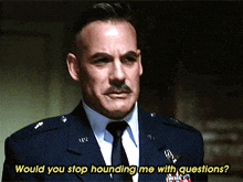 a man in a suit and tie says " would you stop hounding me with questions "