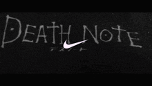 a black and white photo of a nike logo flying over a lake