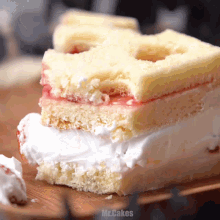 a piece of cake with a bite taken out of it and the words mr.cakes visible