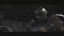 a close up of a video game character with a helmet on