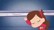 a girl in a red sweater with a star on it is smiling with her eyes closed