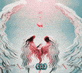 a blurry picture of two pink flamingos flying