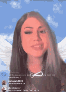 a girl with a blue sky behind her and the words " she 's coming guy " on the bottom