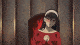 a girl with long black hair is dancing in a room