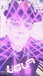 a man wearing a purple shirt that says ueua