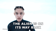 the alien is on its way back is written on a white background