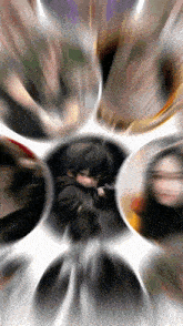 a blurry picture of a person in a circle with other people