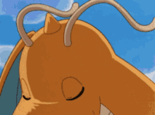 a cartoon dragon with its eyes closed and a sword in its mouth