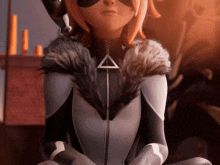 a close up of a cartoon character with a triangle on her chest