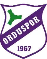 a purple and white shield with ordusspor 1967 on it