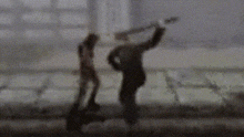 a blurry picture of a person standing on a sidewalk