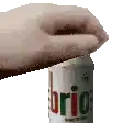 a hand is reaching for a can of brio .