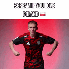 a man wearing a red and black shirt is screaming if you love poland