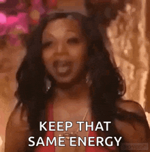 a woman is saying keep that same energy .