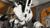a robot with the letter l on it 's head