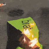 a green and black flag with the word bra on it