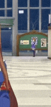 a woman in a blue dress is standing in a room in front of a green board .