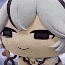 a close up of a cartoon character 's face with white hair