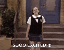 a girl in a school uniform is standing on a set of stairs with the words sooo excited written on the bottom .