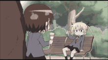 a girl is sitting on a bench while another girl is holding an ice cream cone ..