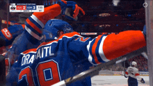 a hockey player wearing a jersey with the number 10 on it