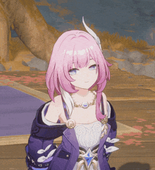 a girl with pink hair is wearing a necklace