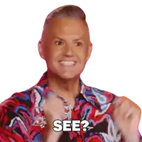 a man wearing a colorful shirt is asking " see "