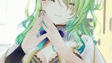 a close up of a girl 's face with green hair