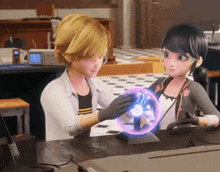 a boy and a girl are sitting at a table looking at a glowing ball .