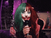 a woman dressed as a clown is holding a microphone