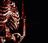 a bloody skeleton is holding a microphone in front of a black background