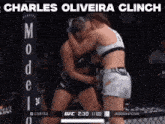 a boxing match between charles oliveira clinch and jasudavicius cortez