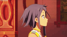 a girl with purple hair is standing in a room with a sword .