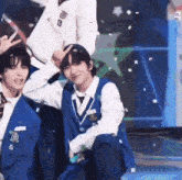a group of young men in school uniforms are posing for a picture