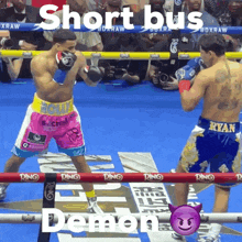 two boxers are fighting in a ring with the words short bus demon on the bottom