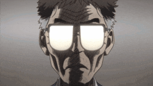 a close up of a man wearing glasses with a light shining through them