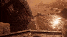 a video game shows a landscape with a river and rocks