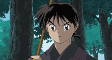 a boy with a sword in his hand stands in the woods