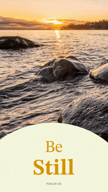a sunset over a body of water with the words be still