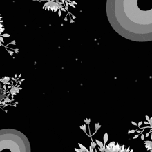 a black and white image with arabic writing and flowers