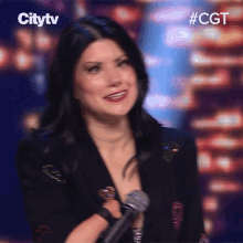 Laughing Courtney Gilmour GIF - Laughing Courtney Gilmour Canadas Got Talent GIFs