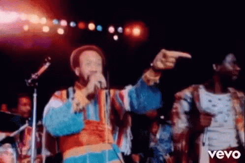 Earth Wind And Fire Singing GIF - Earth Wind And Fire Singing Pointing GIFs