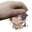 a hand is holding a cartoon character 's head .