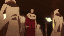 a man in a red robe is standing next to two other men in white coats