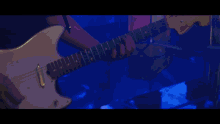 a blurry picture of a man 's face with a blue background