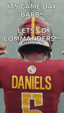 a football player wearing a helmet and a jersey with the name daniels on it .
