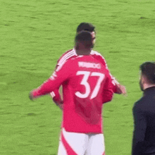 a soccer player with the number 37 on his jersey